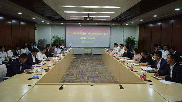 徐鸿与中国资环党委副书记、总经理朱建春举行工作会谈
